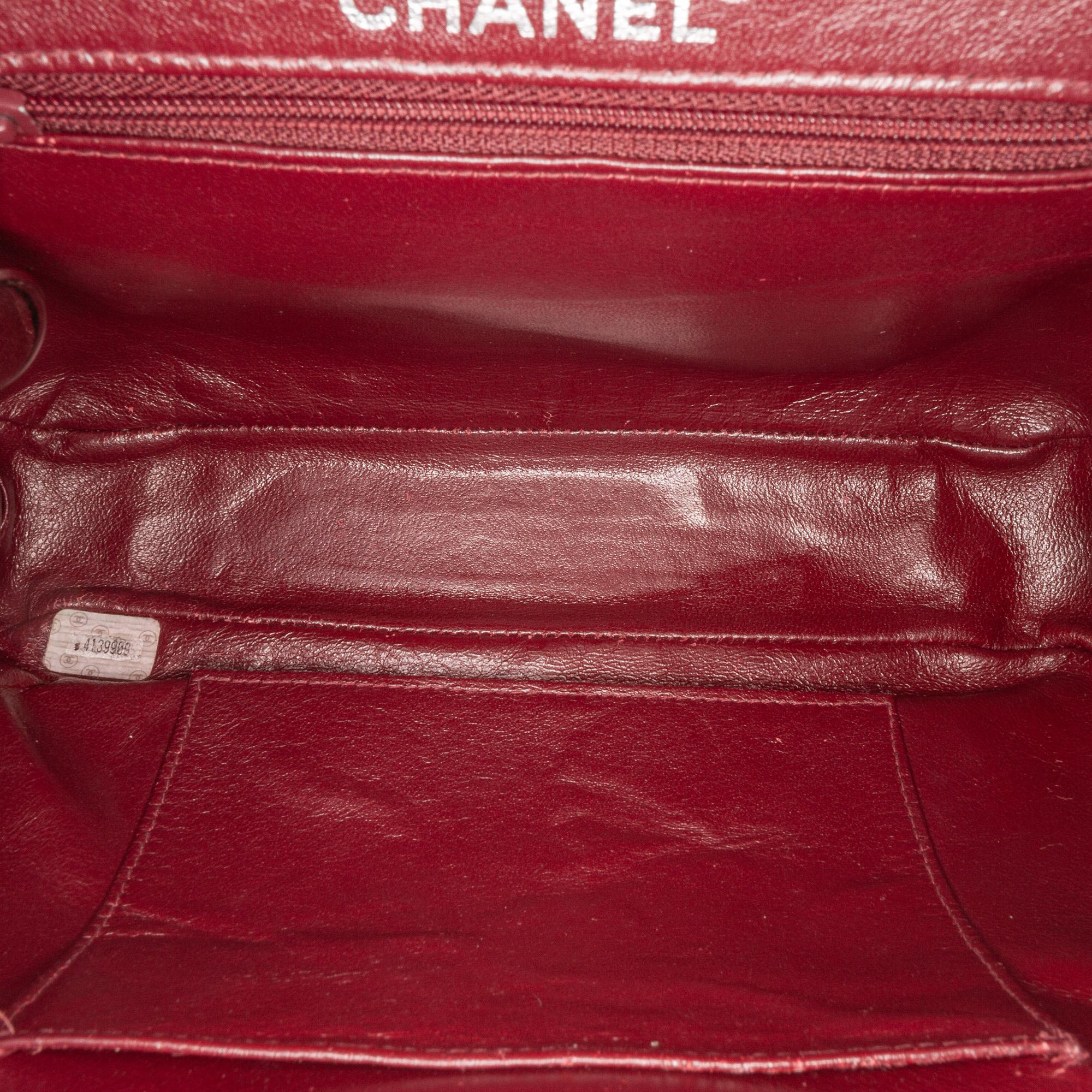 Chanel CC Quilted Lambskin Kiss Lock Frame Top Handle Bag