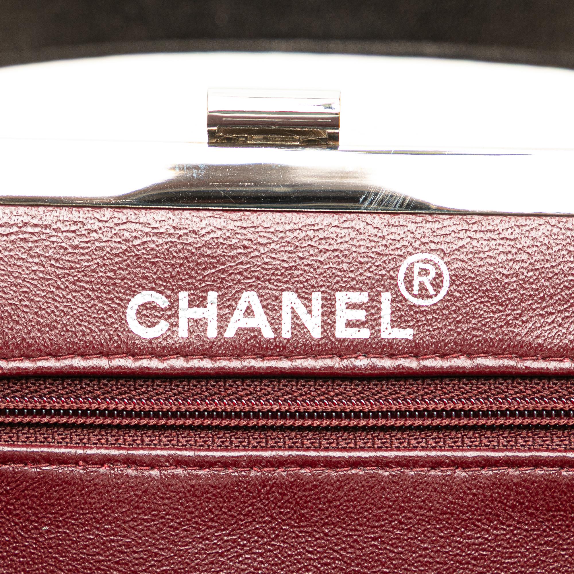 Chanel CC Quilted Lambskin Kiss Lock Frame Top Handle Bag