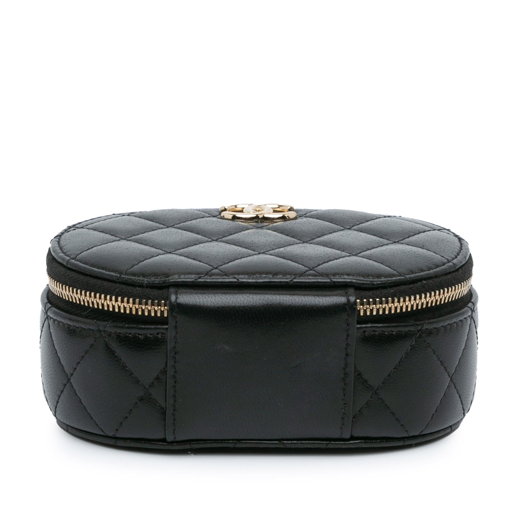 Chanel CC Quilted Lambskin Oval Top Handle Clutch