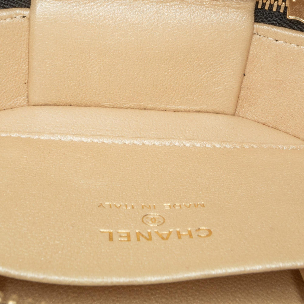 Chanel CC Quilted Lambskin Oval Top Handle Clutch