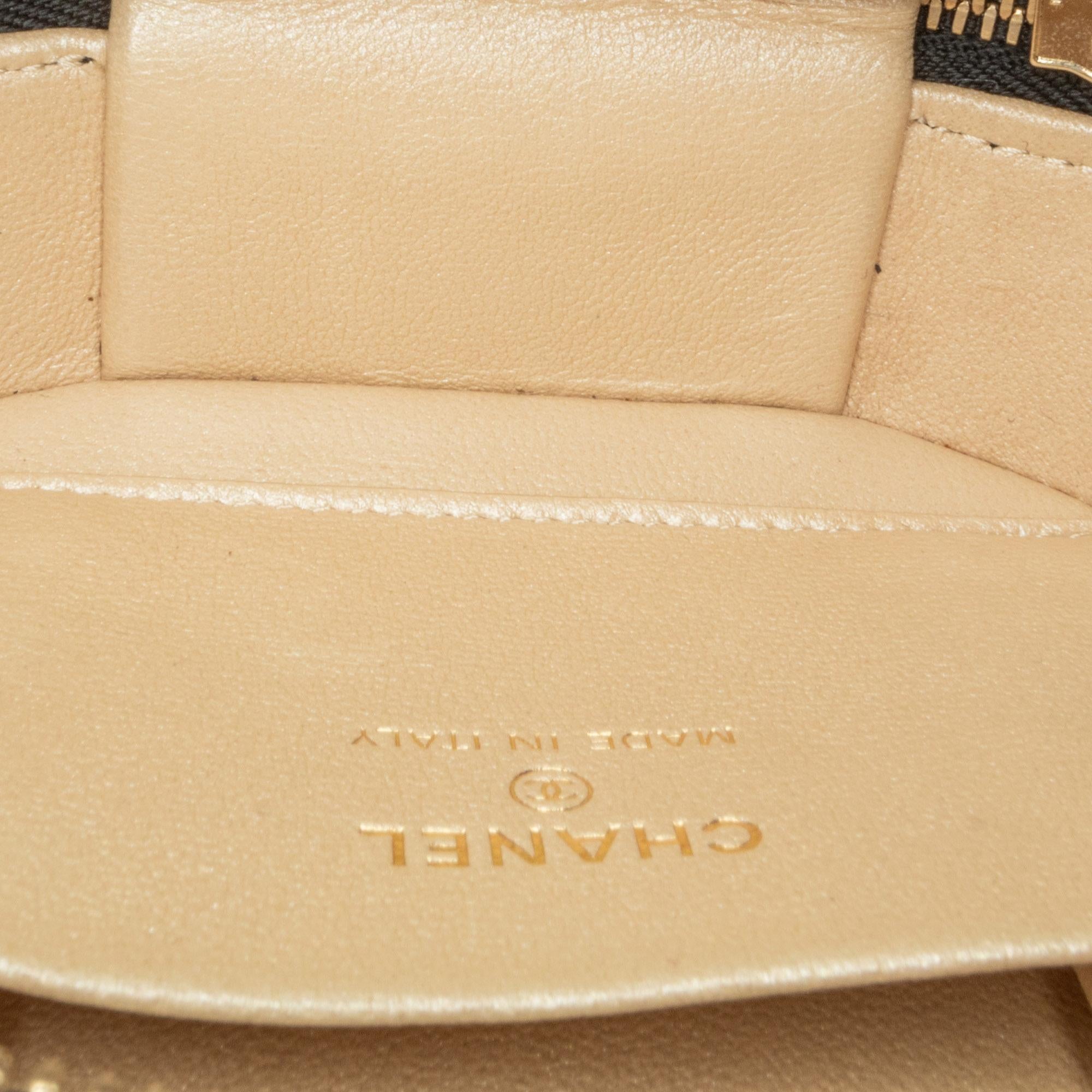 Chanel CC Quilted Lambskin Oval Top Handle Clutch