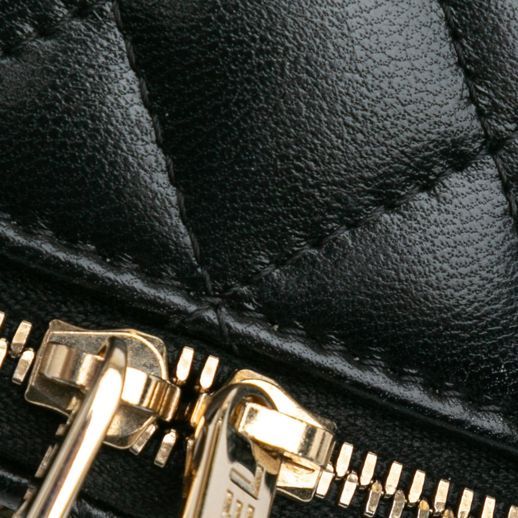 Chanel CC Quilted Lambskin Oval Top Handle Clutch