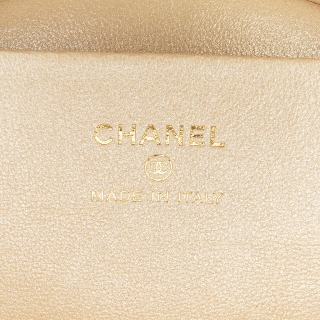 Chanel CC Quilted Lambskin Oval Top Handle Clutch