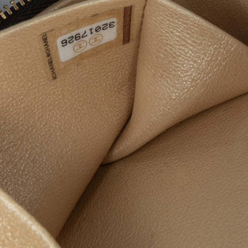 Chanel CC Quilted Lambskin Oval Top Handle Clutch