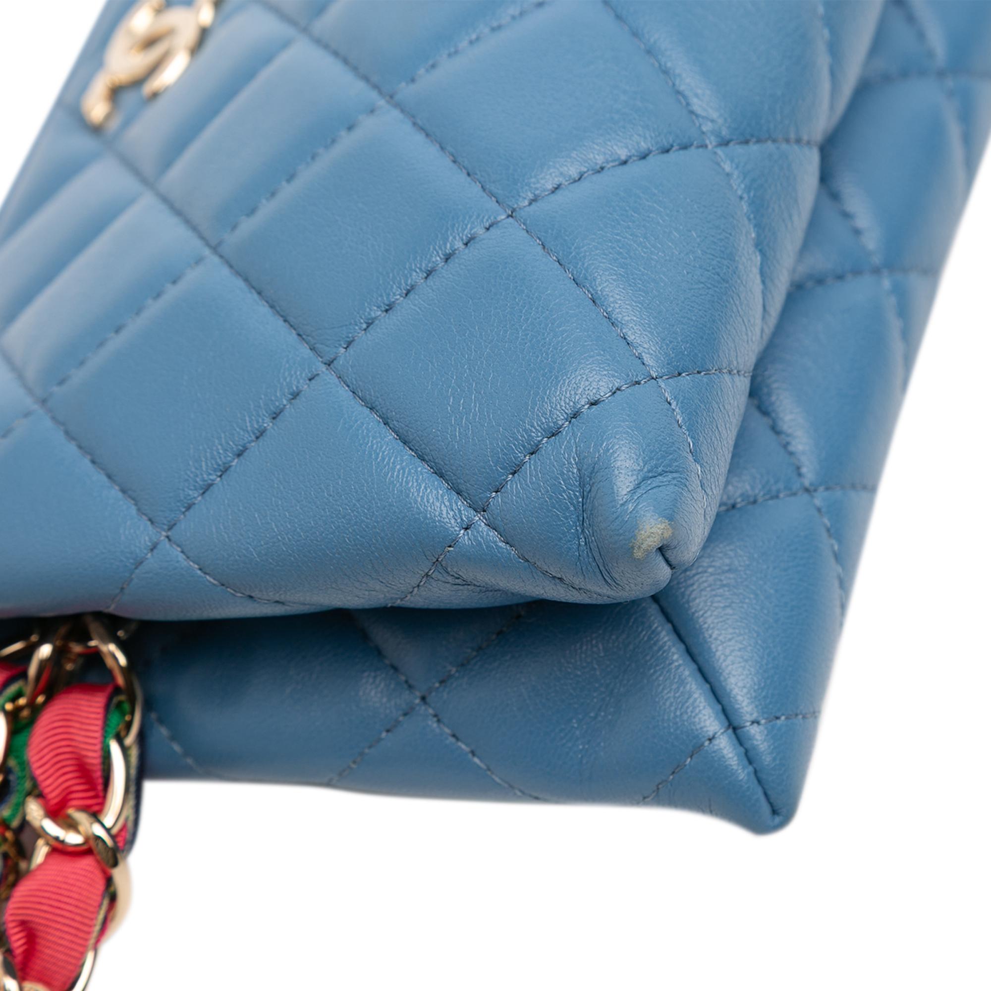 Chanel CC Quilted Lambskin Ribbon Clutch