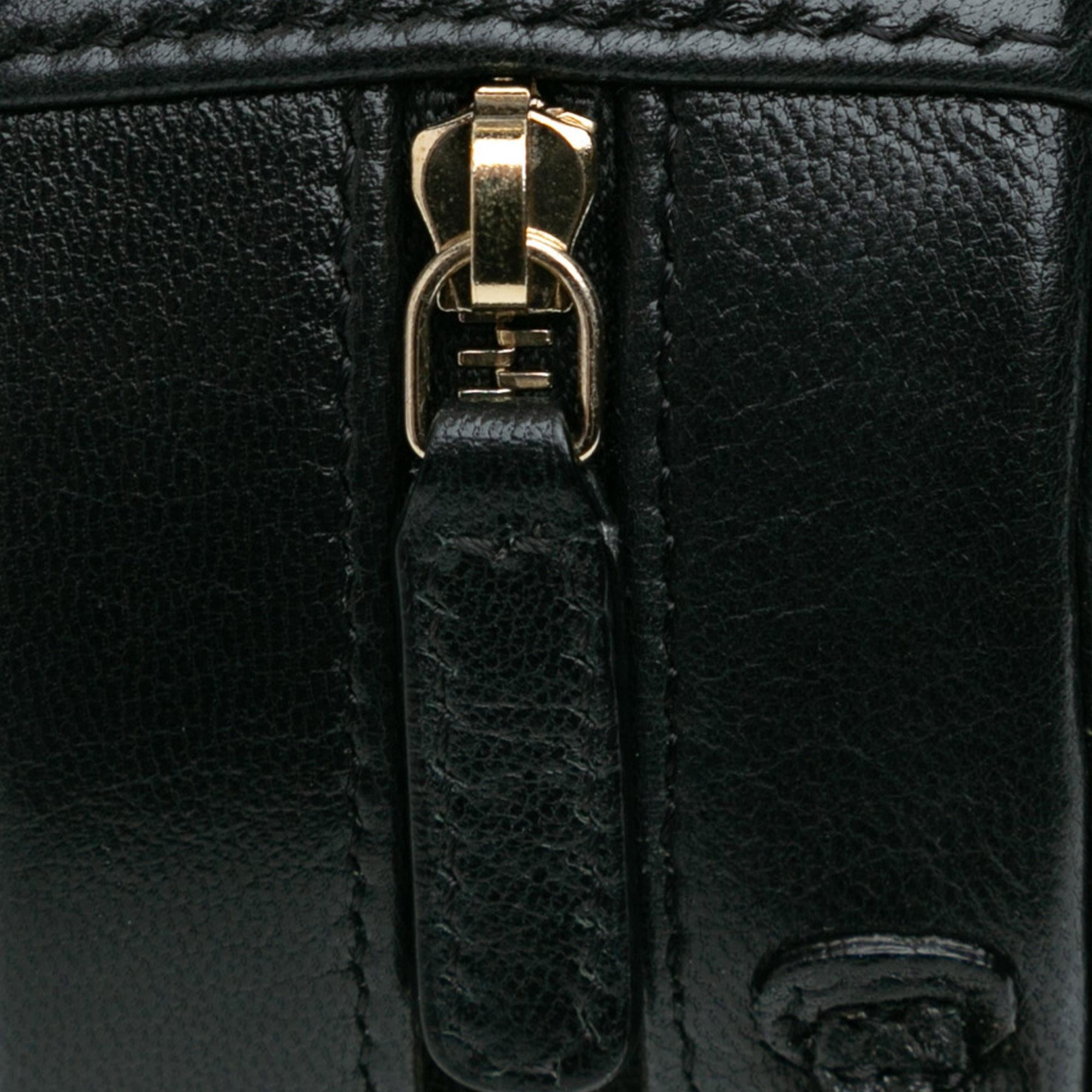 Chanel CC Quilted Lambskin Round Clutch with Chain