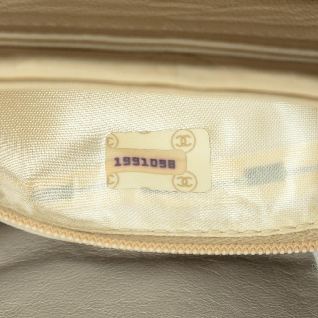 Chanel CC Quilted Lambskin Tassel Chain Vanity Bag