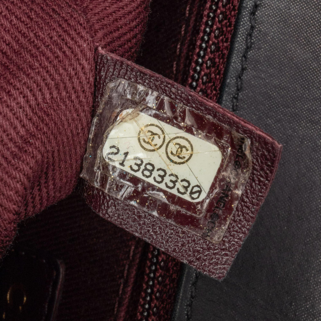 Chanel CC Quilted Lambskin Tassel and Border Embellished Flap