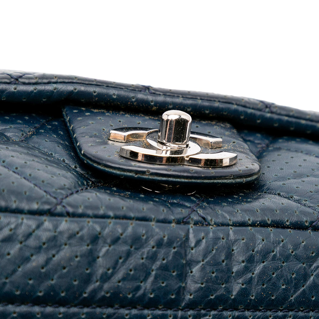 Chanel CC Quilted Perforated Aged Calfskin Flap