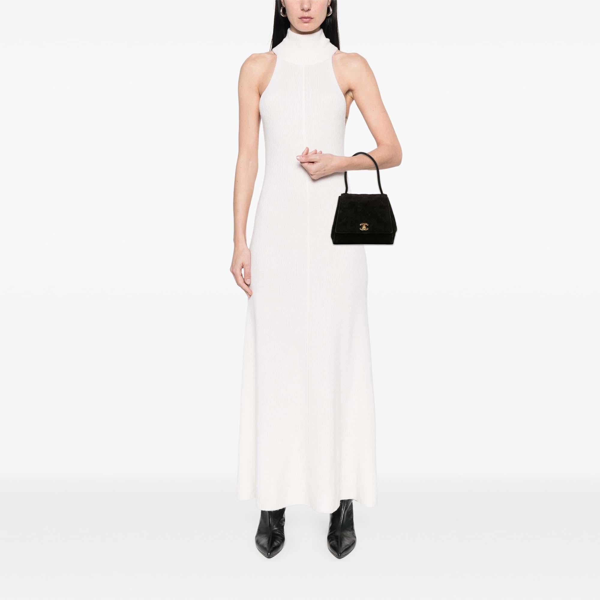 Chanel CC Quilted Velvet Flap