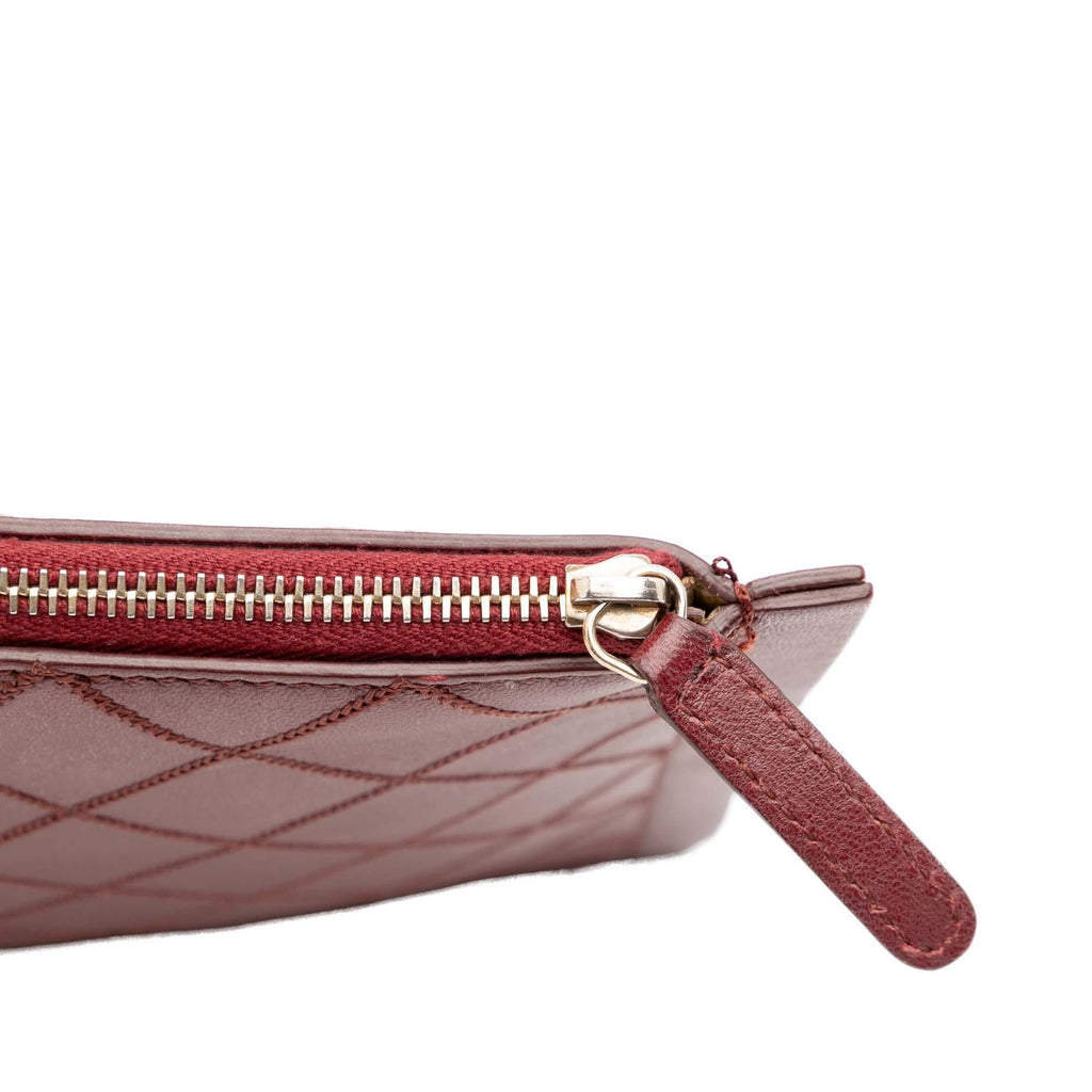 Chanel CC Stitched Lambskin Clutch