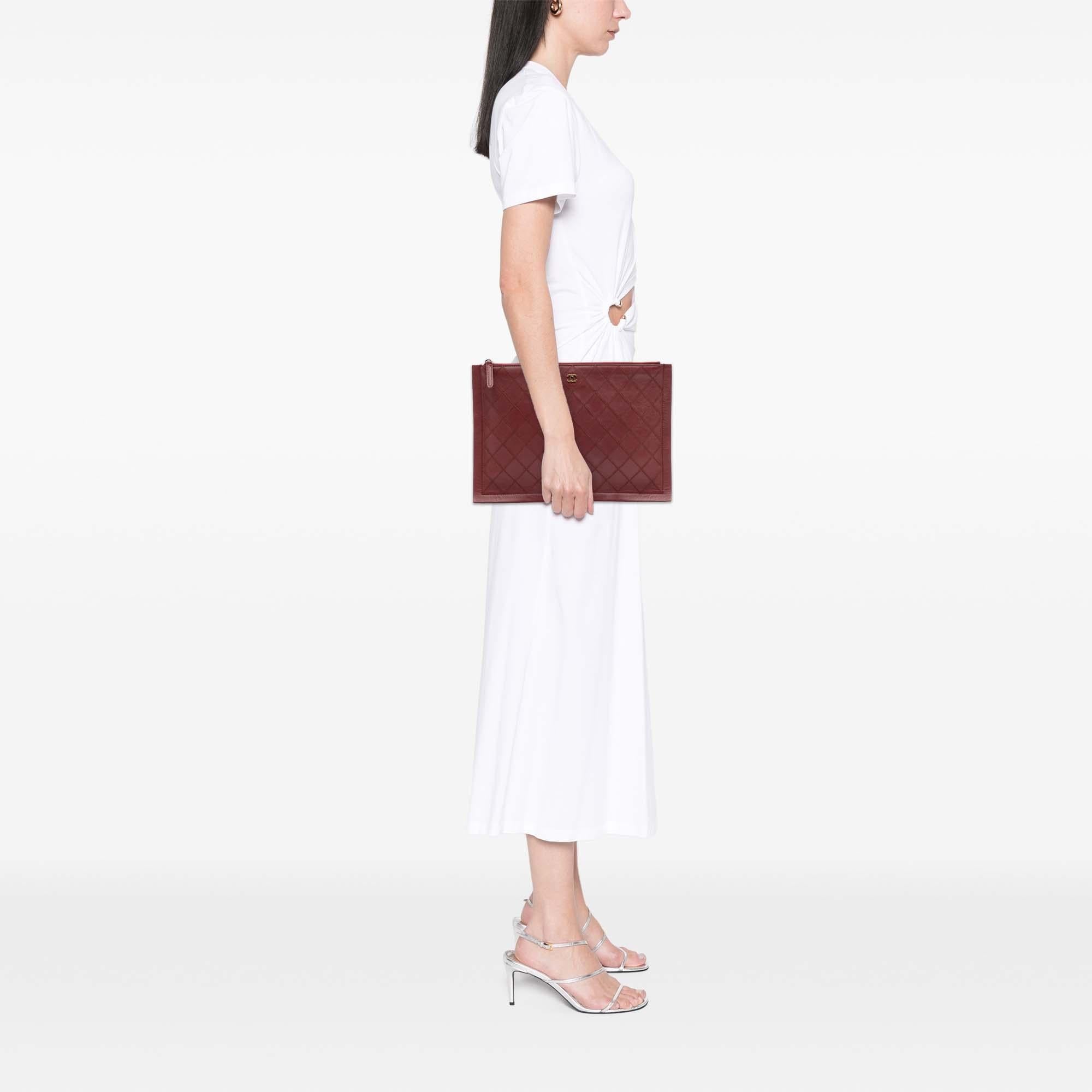 Chanel CC Stitched Lambskin Clutch