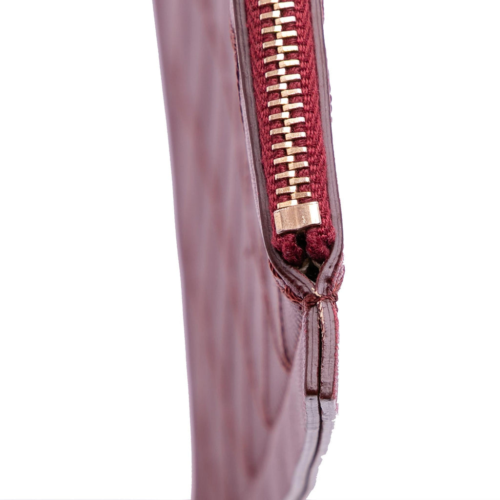 Chanel CC Stitched Lambskin Clutch