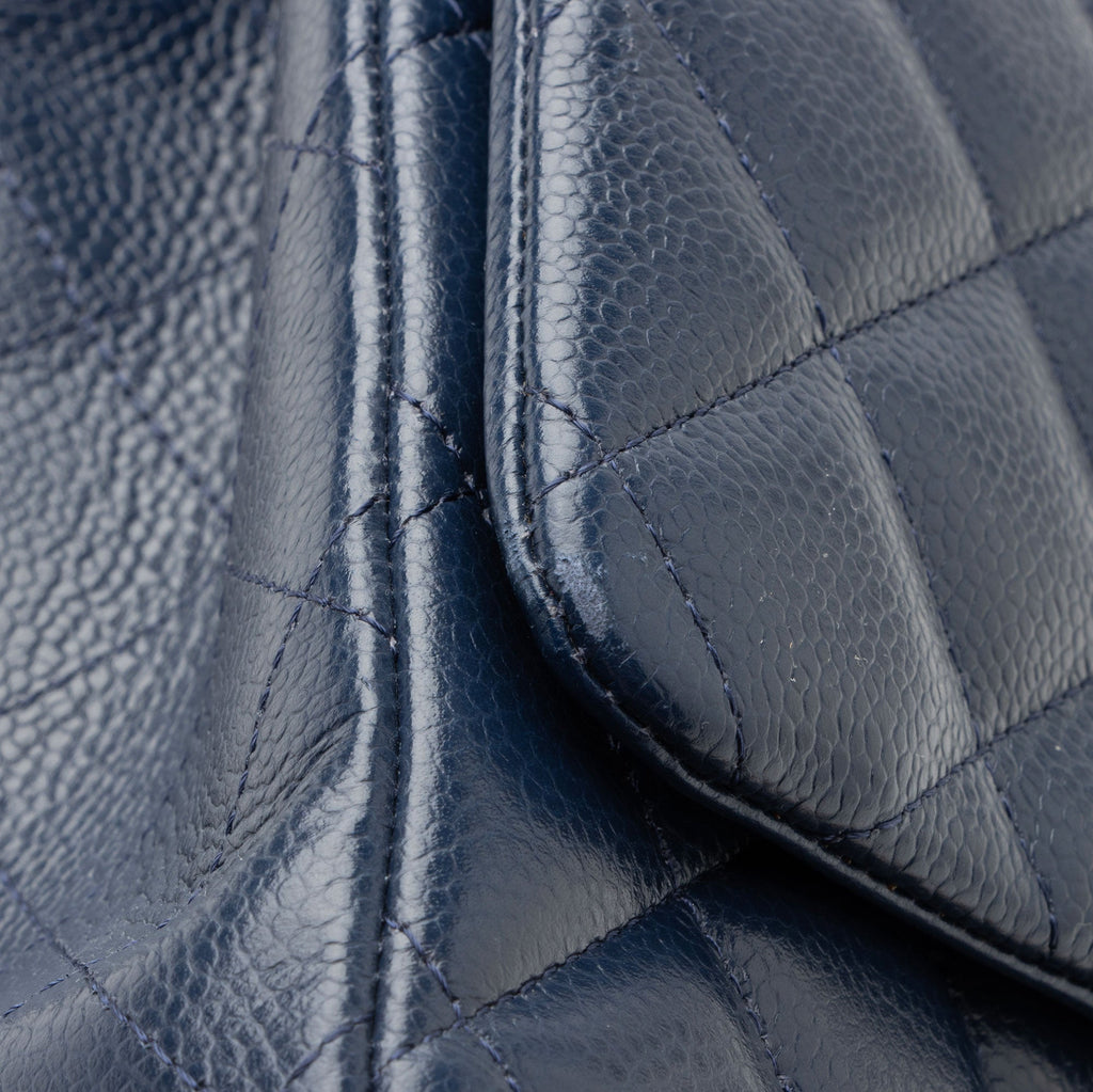 Chanel Caviar Leather Classic Maxi Double Flap Bag (SHF-U7Rzaz)