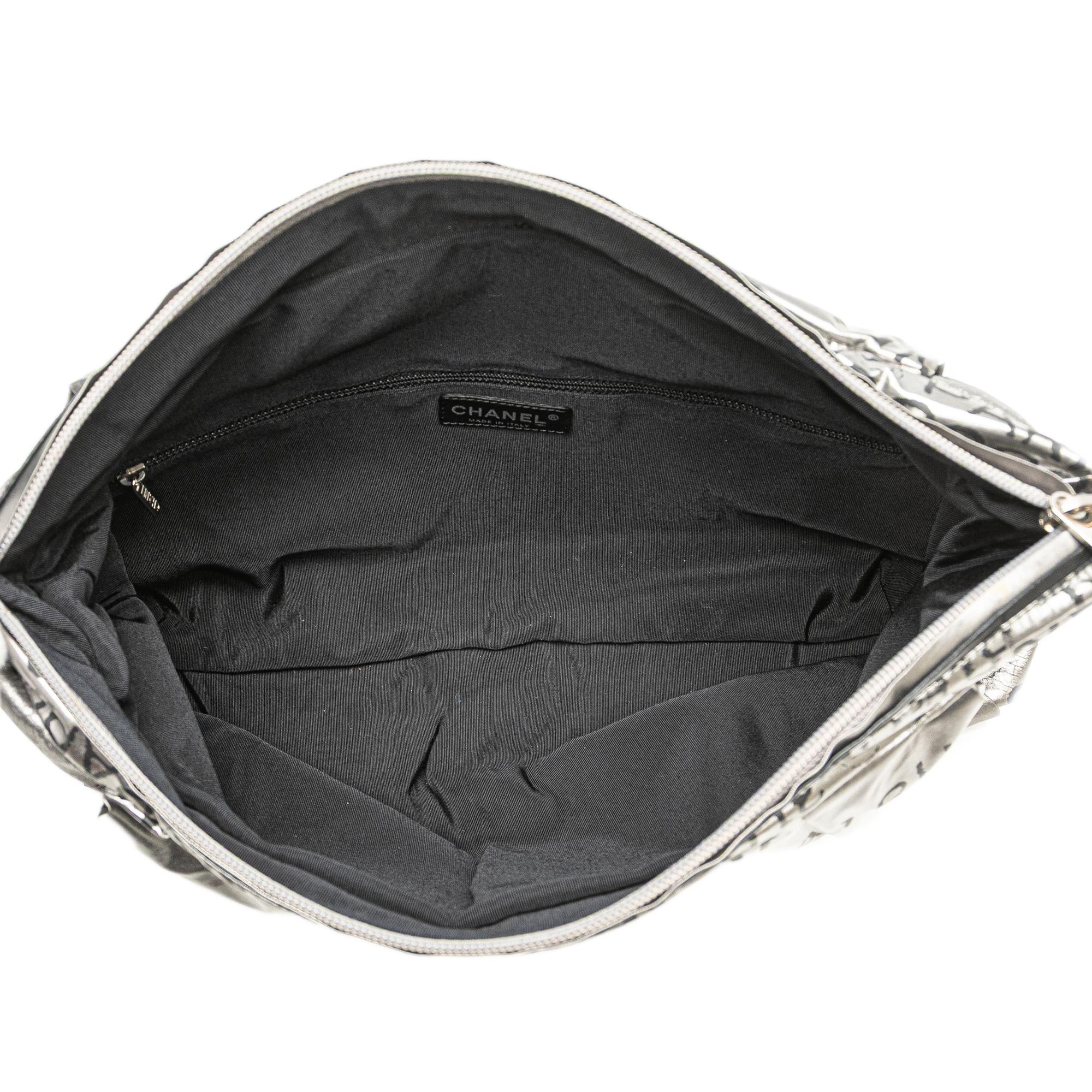 Chanel Coated Canvas Unlimited Clutch