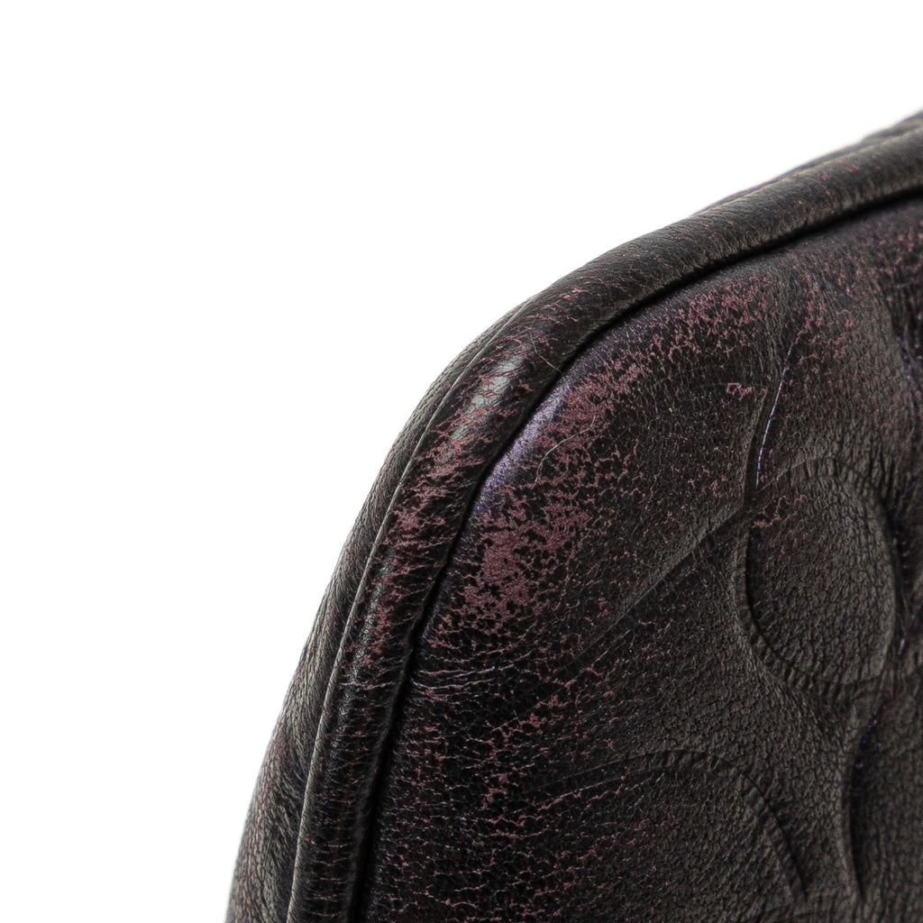 Chanel Embossed Lambskin Camellia Chain Pochette