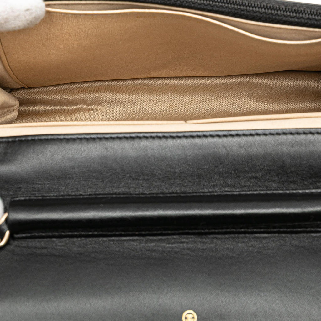 Chanel Lambskin Camellia Embossed Wallet On Chain