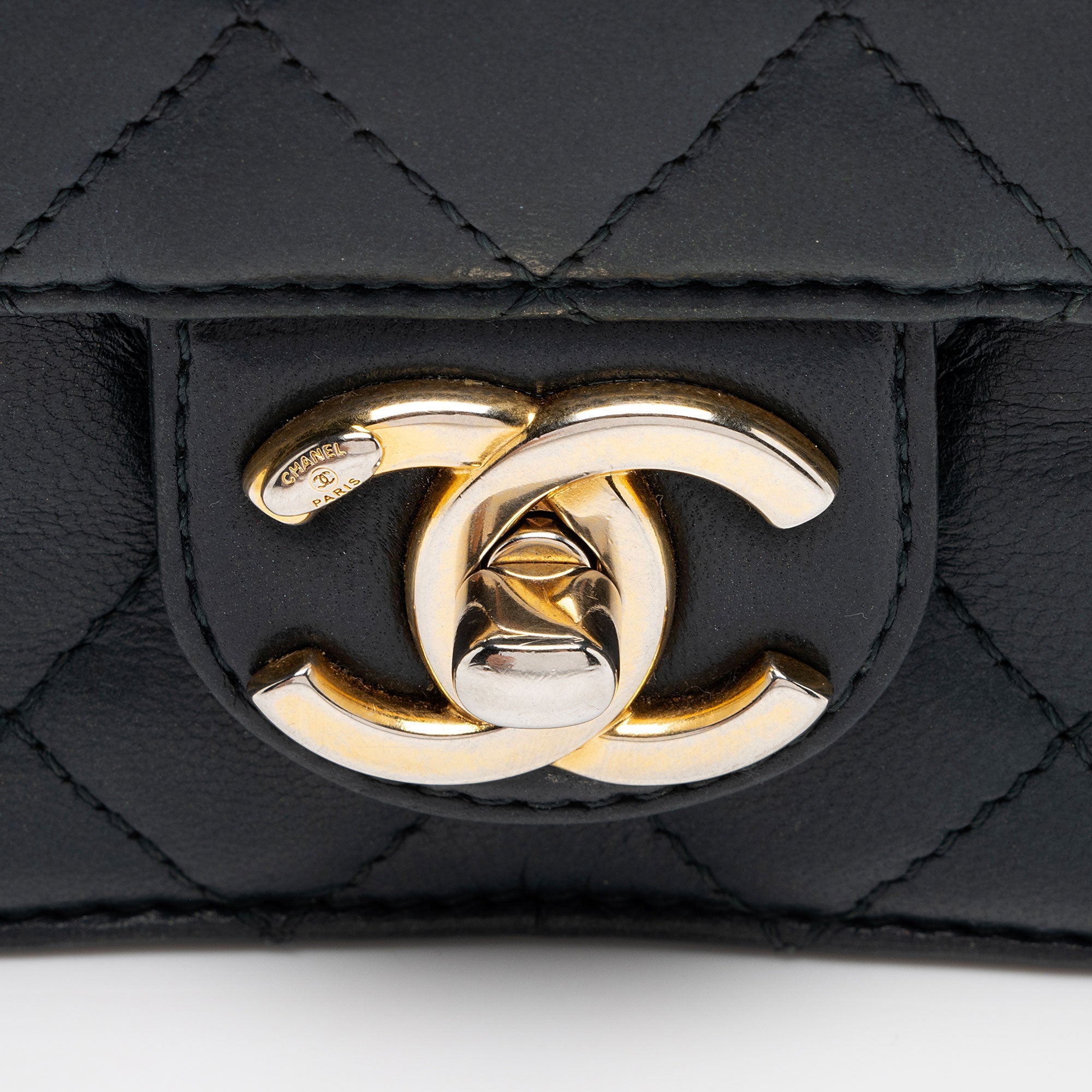 Chanel Lambskin Crossing Times Mini Flap Bag (SHF-Tv2M1K)