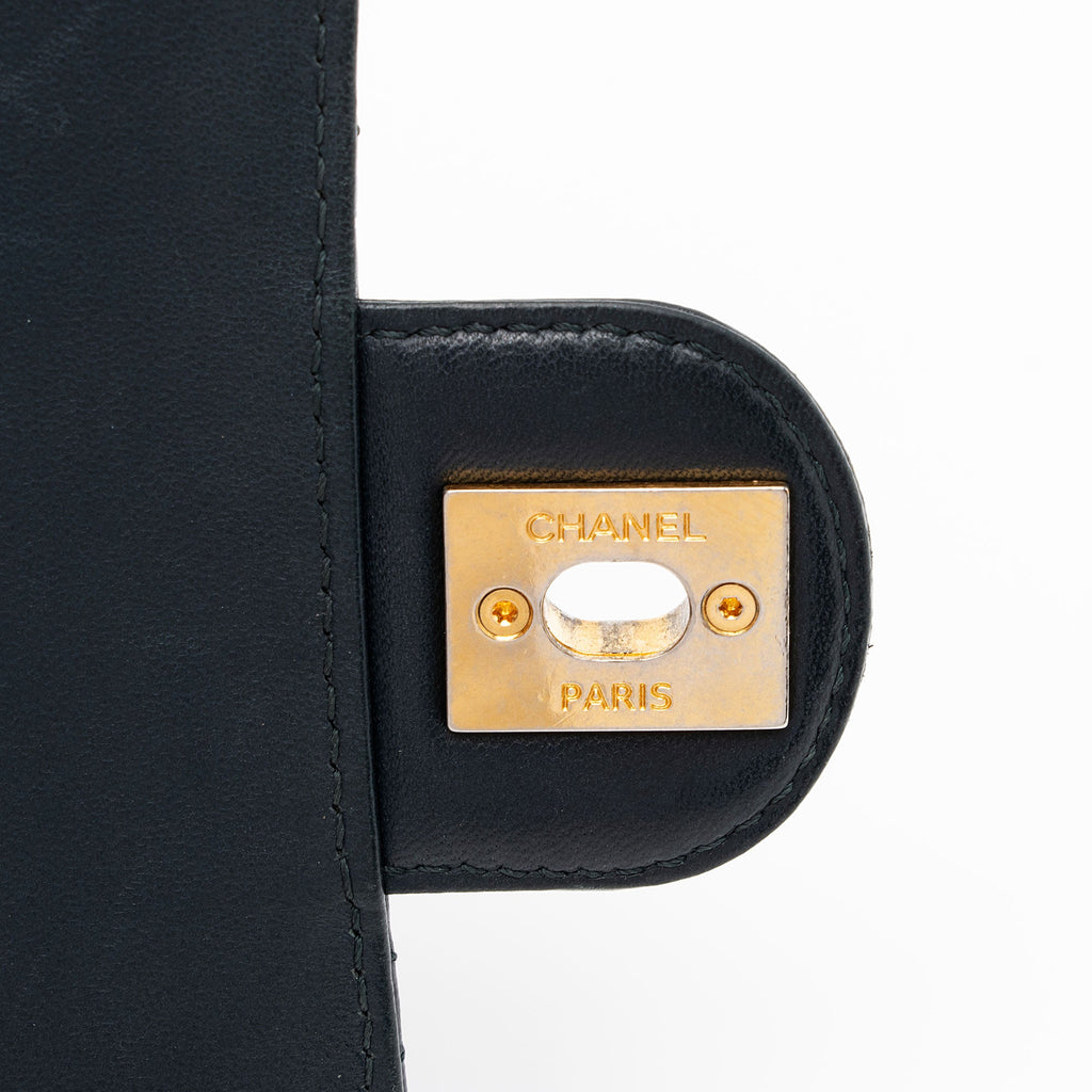 Chanel Lambskin Crossing Times Mini Flap Bag (SHF-Tv2M1K)