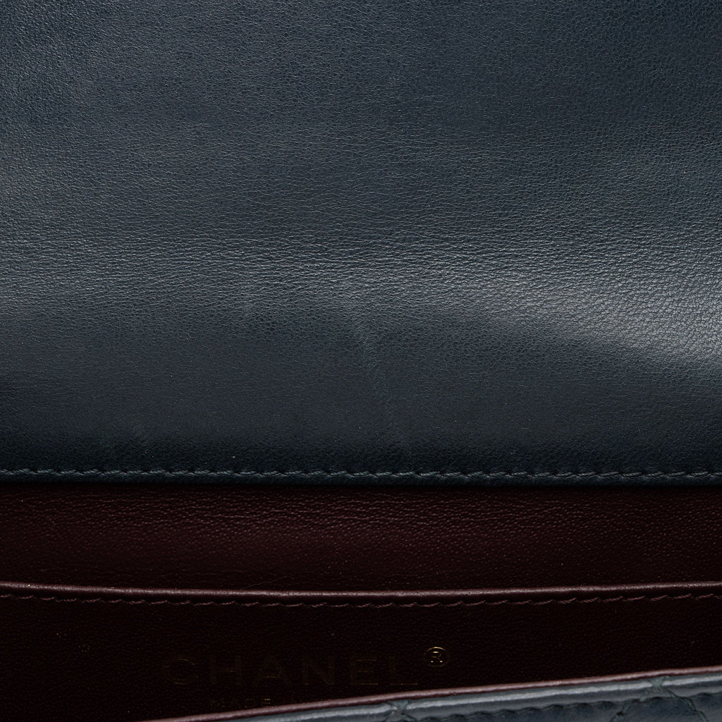 Chanel Lambskin Crossing Times Mini Flap Bag (SHF-Tv2M1K)