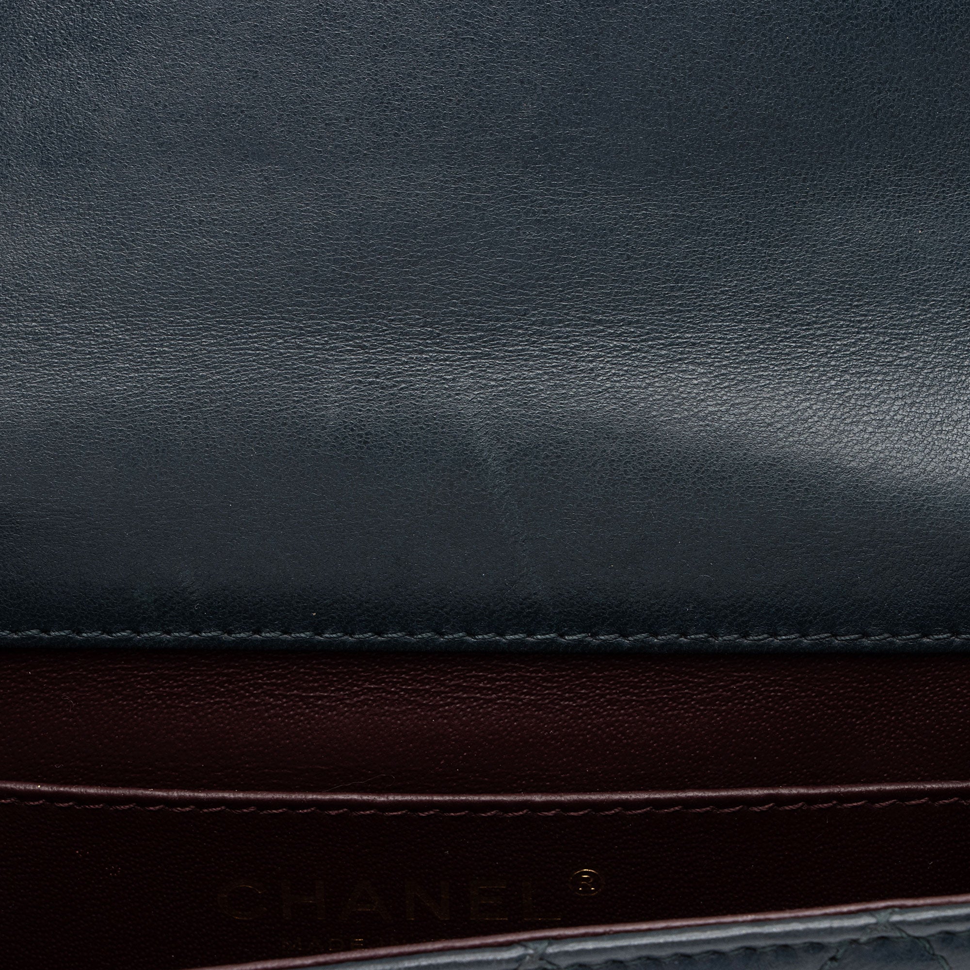 Chanel Lambskin Crossing Times Mini Flap Bag (SHF-Tv2M1K)