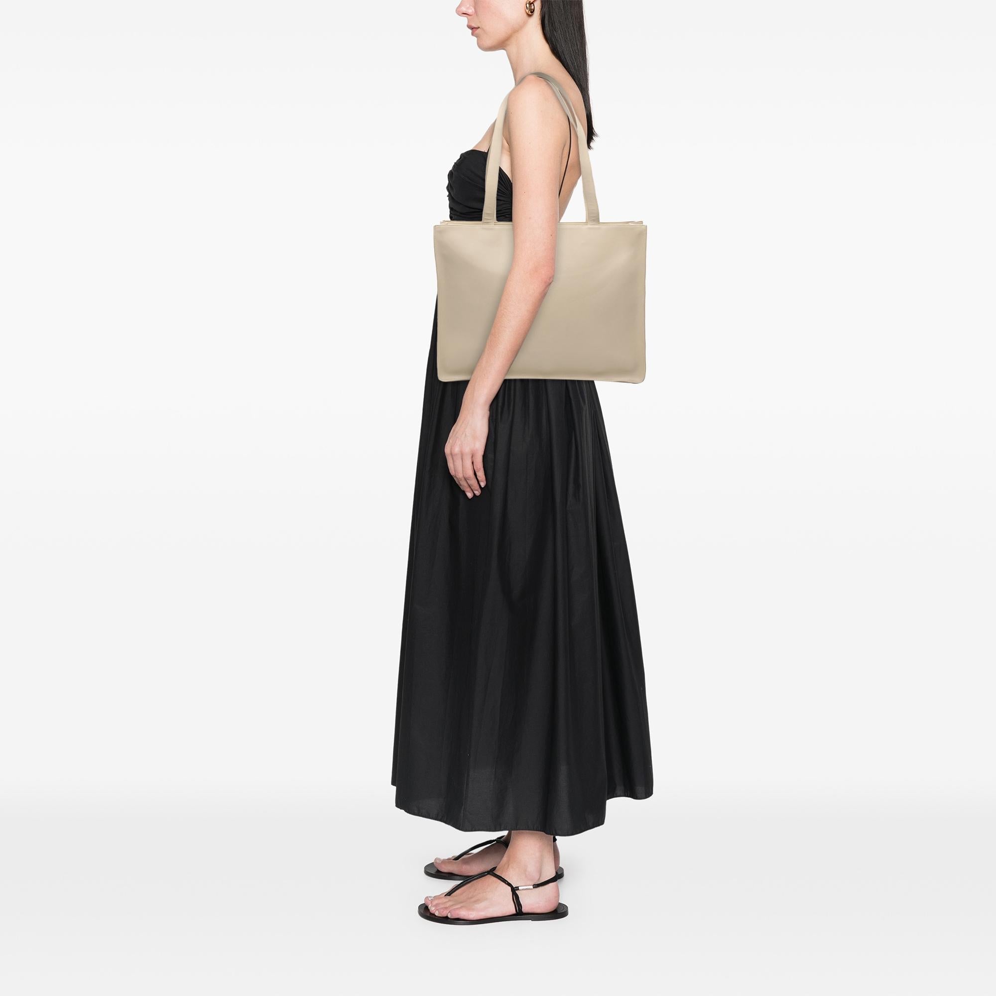Chanel Lambskin Embossed CC Camellia Tote