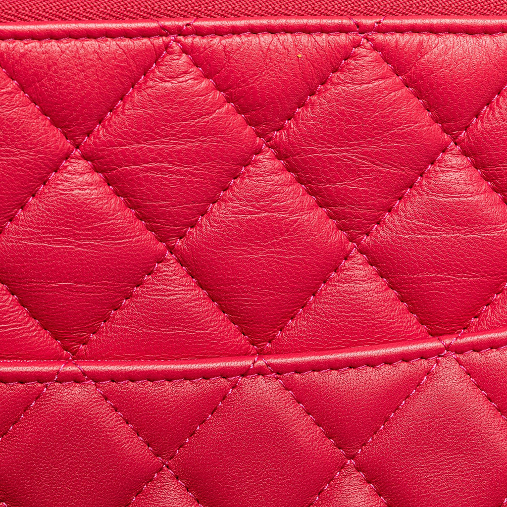 Chanel Large Quilted Lambskin O Case Clutch