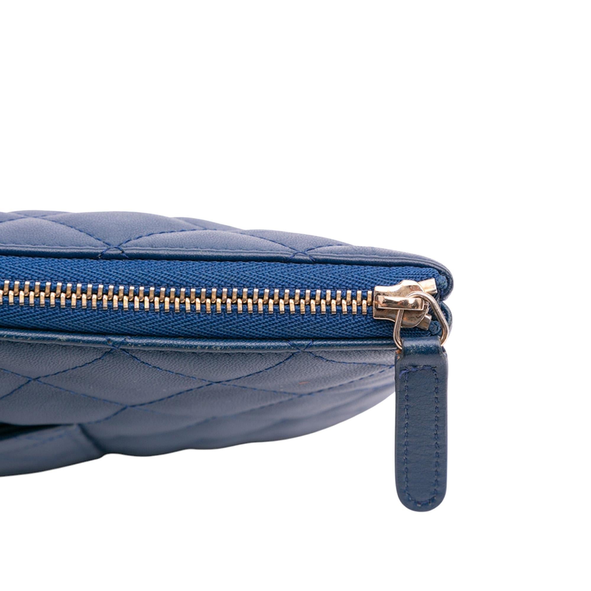 Chanel Large Quilted Lambskin O Case Clutch