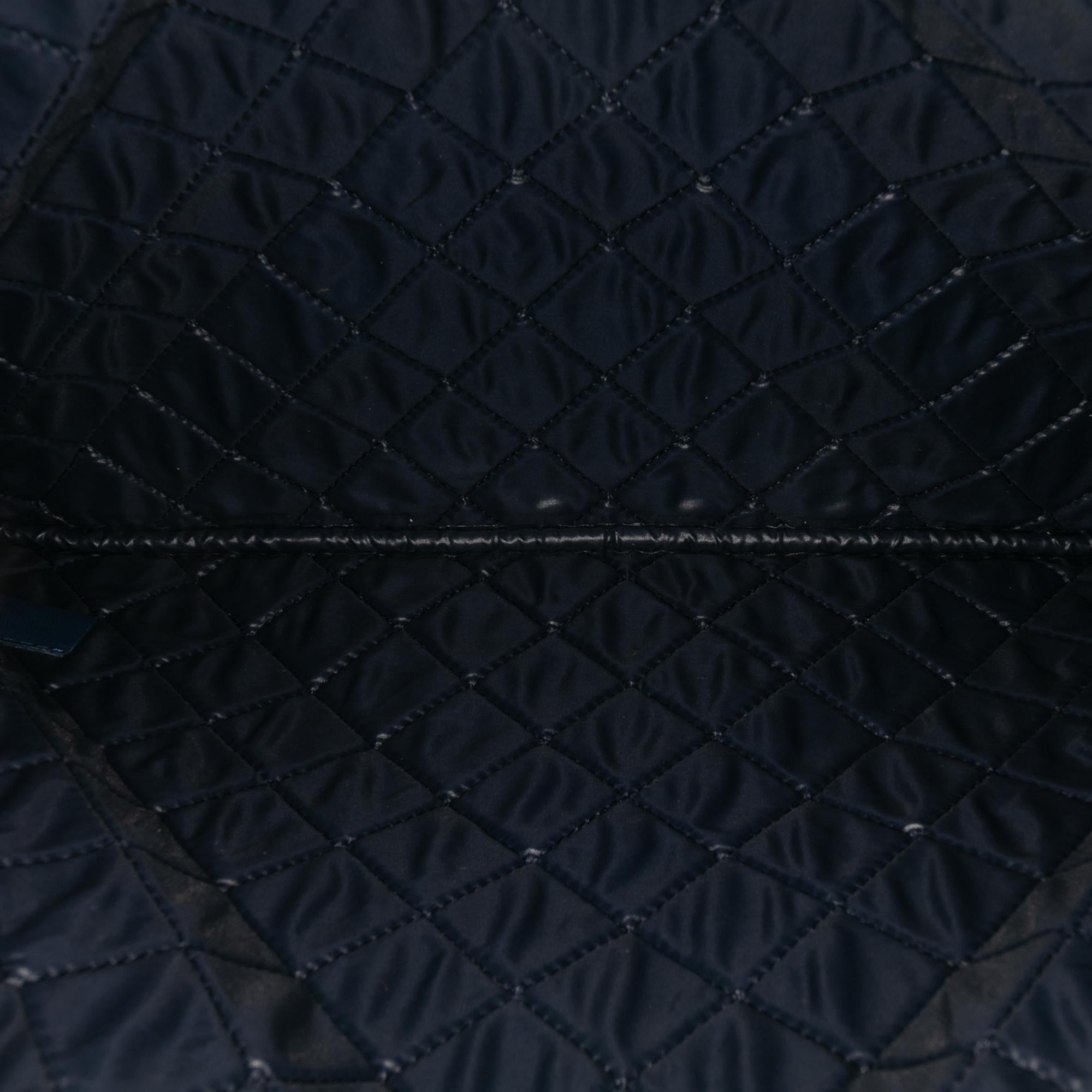 Chanel Large Quilted Lambskin O Case Clutch