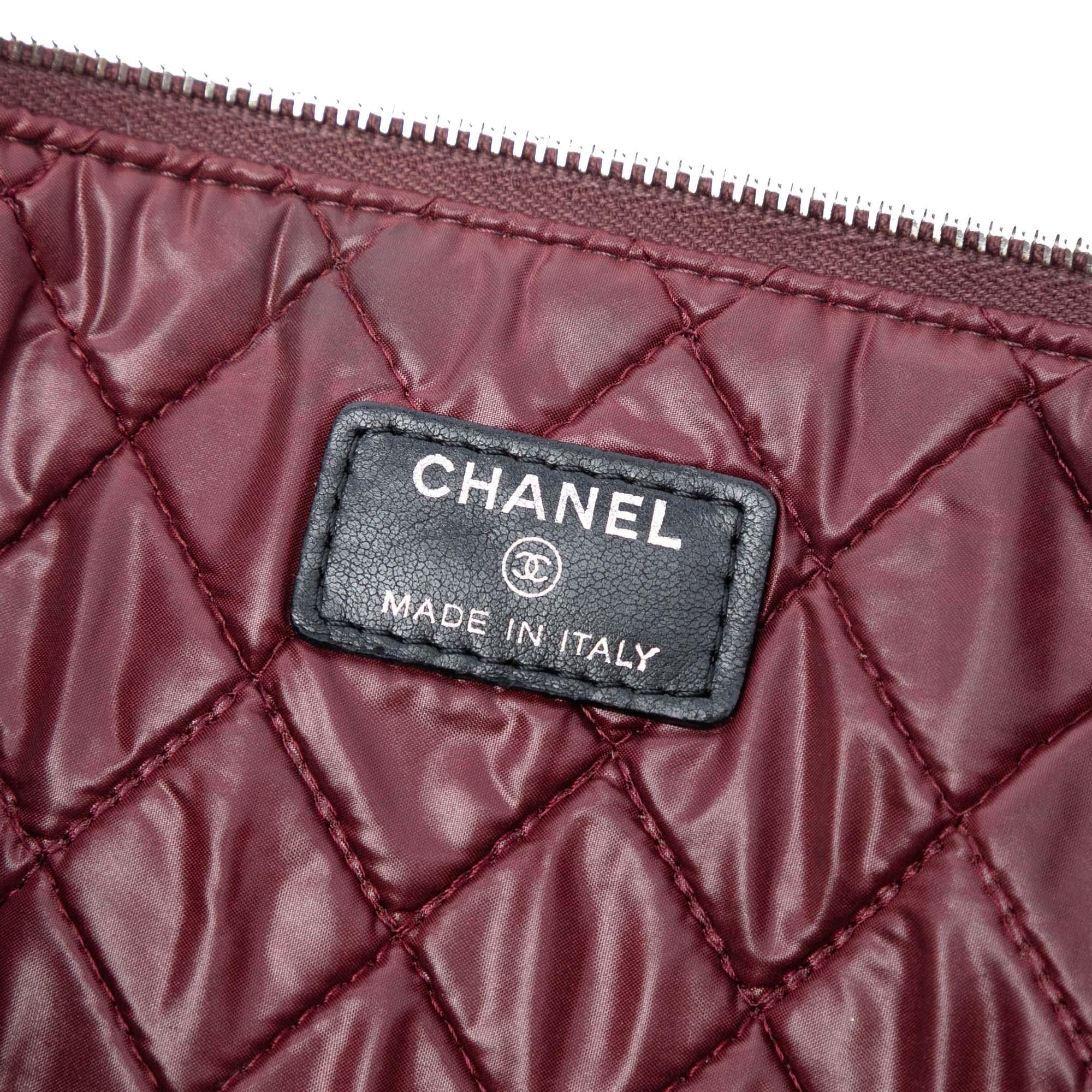 Chanel Large Quilted Lambskin O Case Clutch