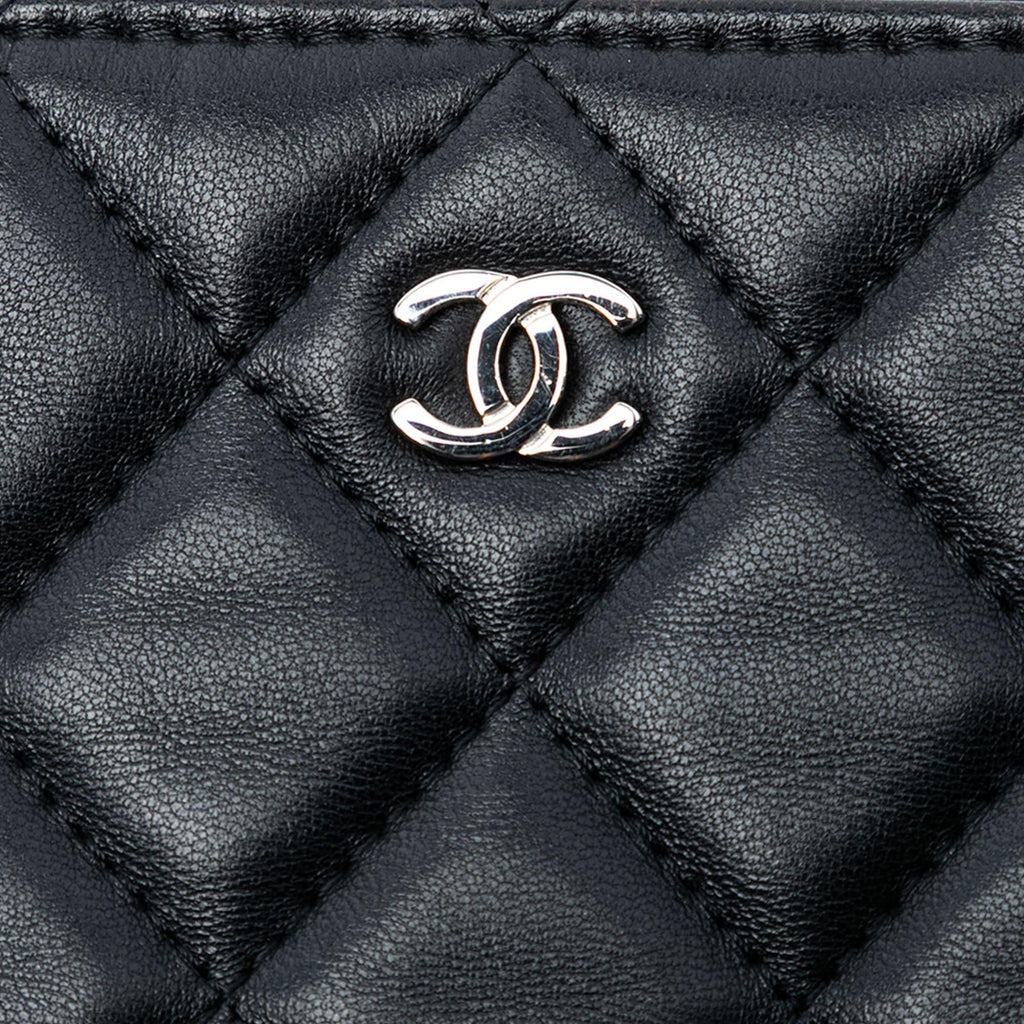 Chanel Large Quilted Lambskin O Case Clutch