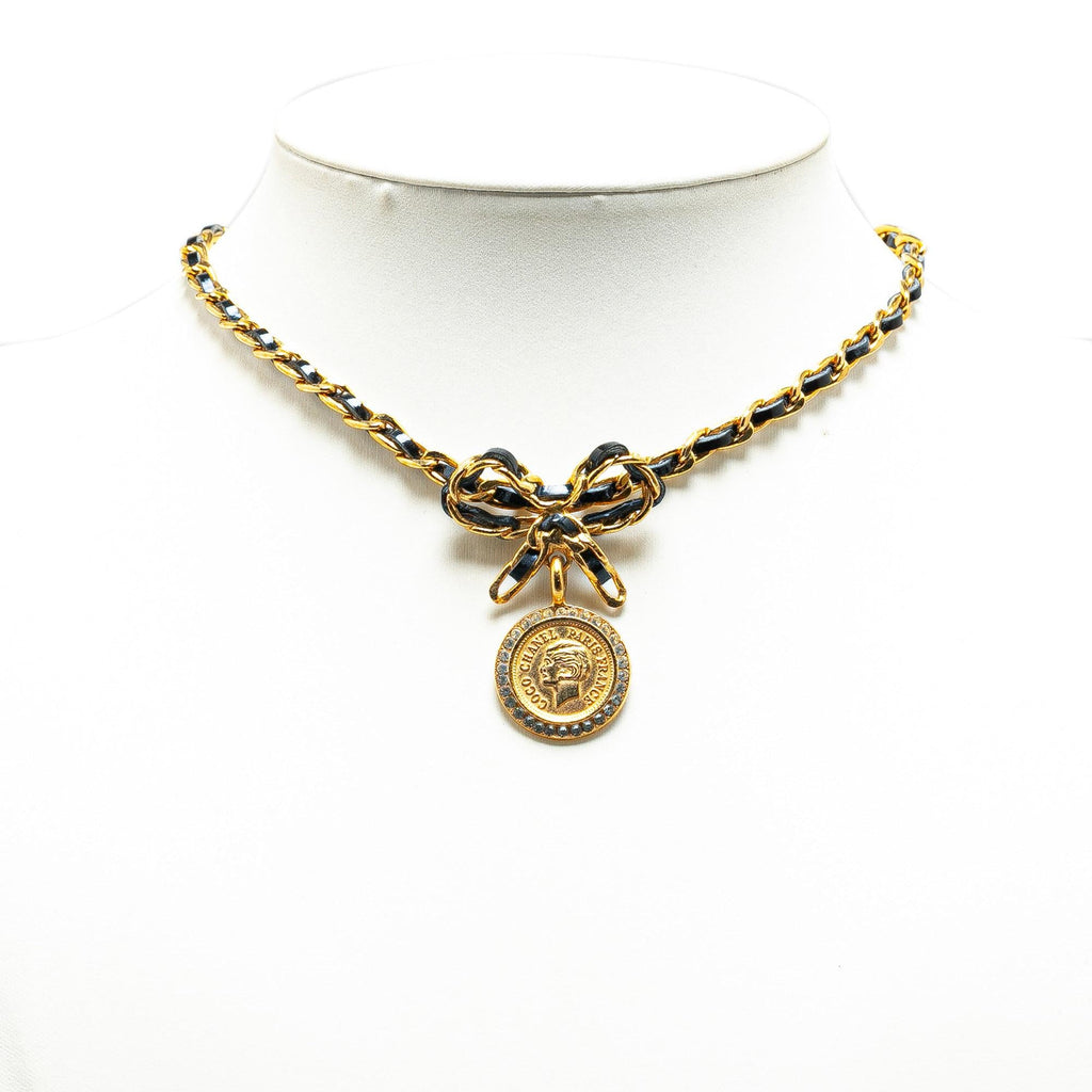 Chanel Leather and Gold Plated Medallion Bow Pendant Necklace
