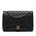 Chanel Maxi Classic Caviar Double Flap