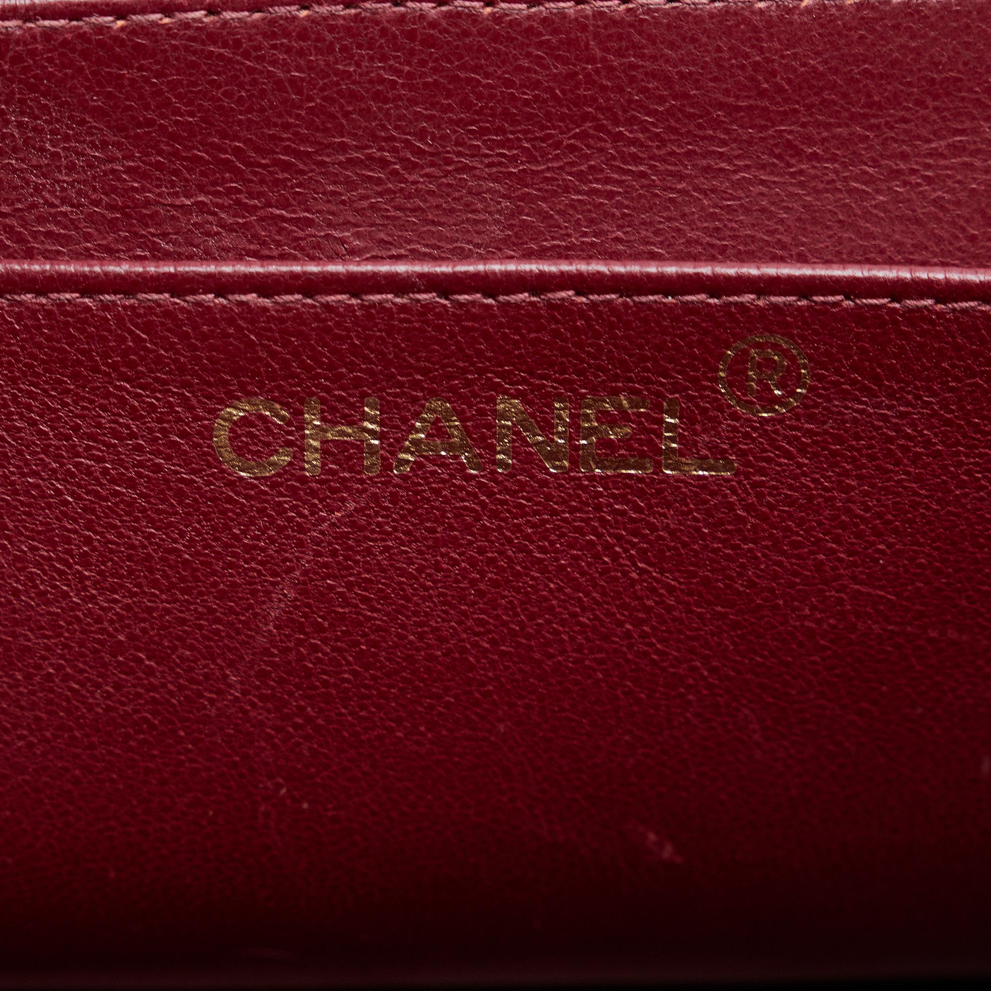 Chanel Maxi Classic Lambskin Double Flap (SHG-EmVxmM)
