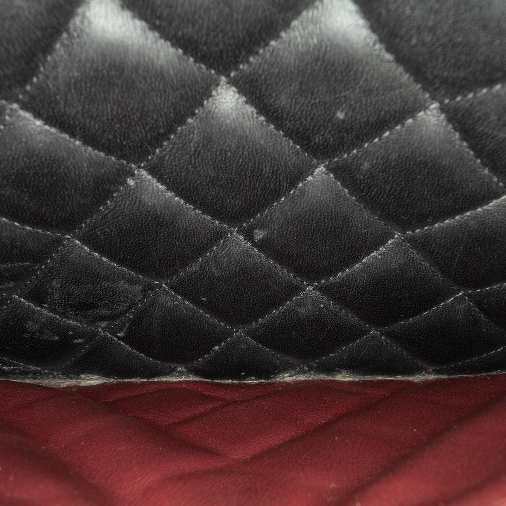 Chanel Maxi Classic Lambskin Double Flap (SHG-5E7enw)