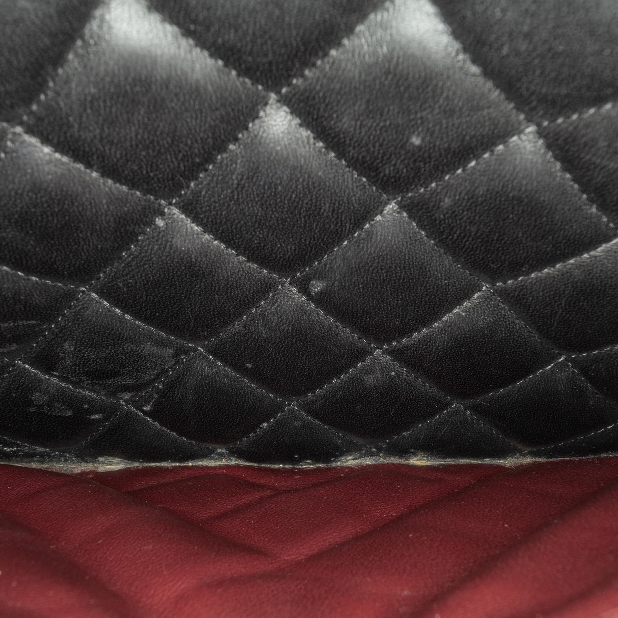 Chanel Maxi Classic Lambskin Double Flap (SHG-5E7enw)