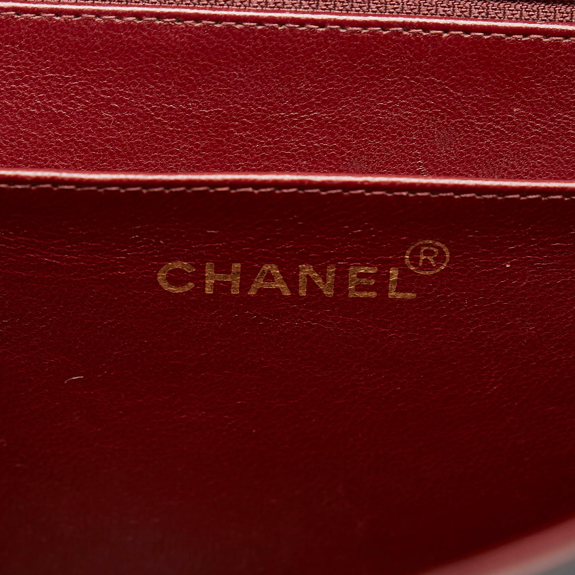 Chanel Maxi Classic Lambskin Single Flap (SHG-bKU9pk)