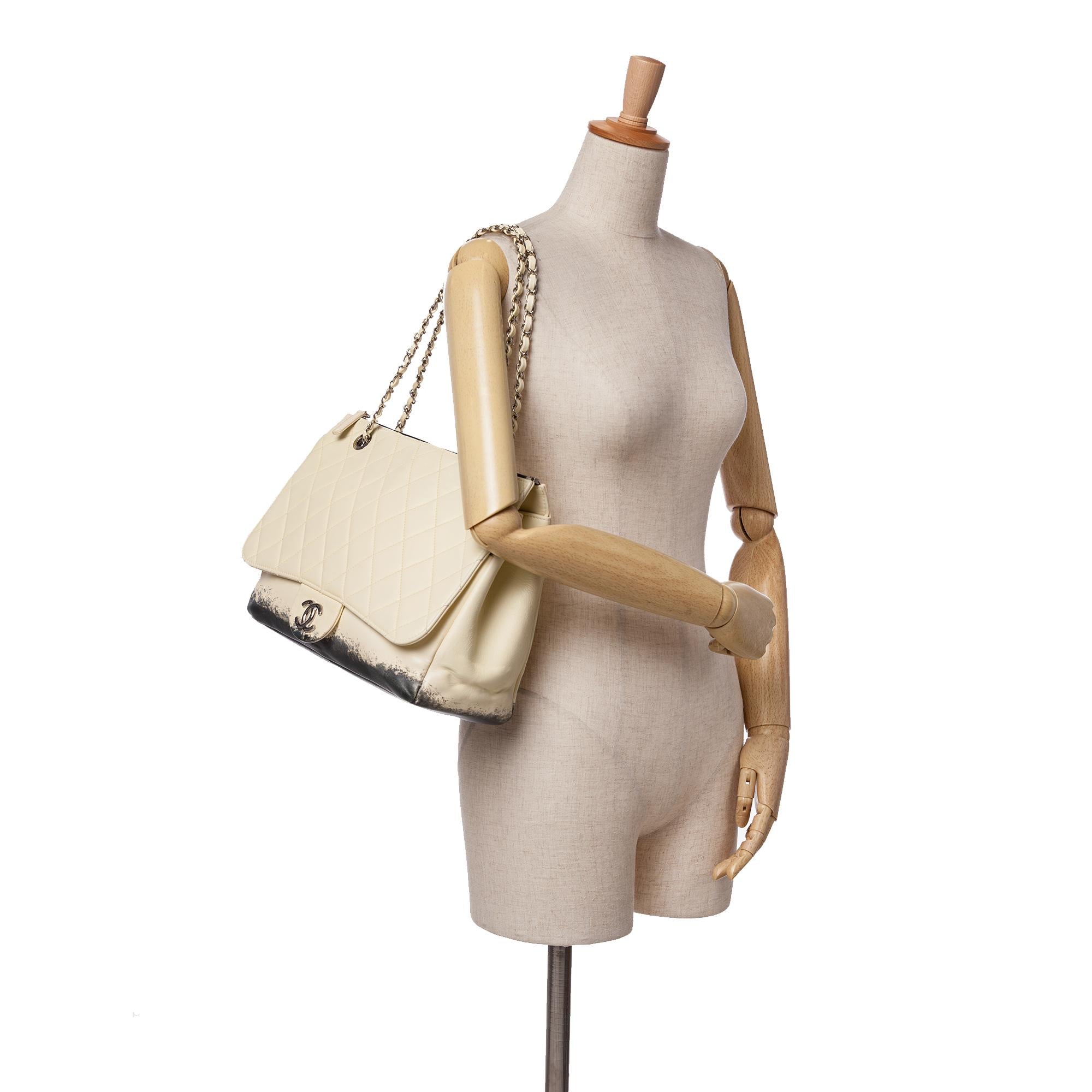Chanel Maxi Quilted Calfskin Blizzard Zip Top Flap