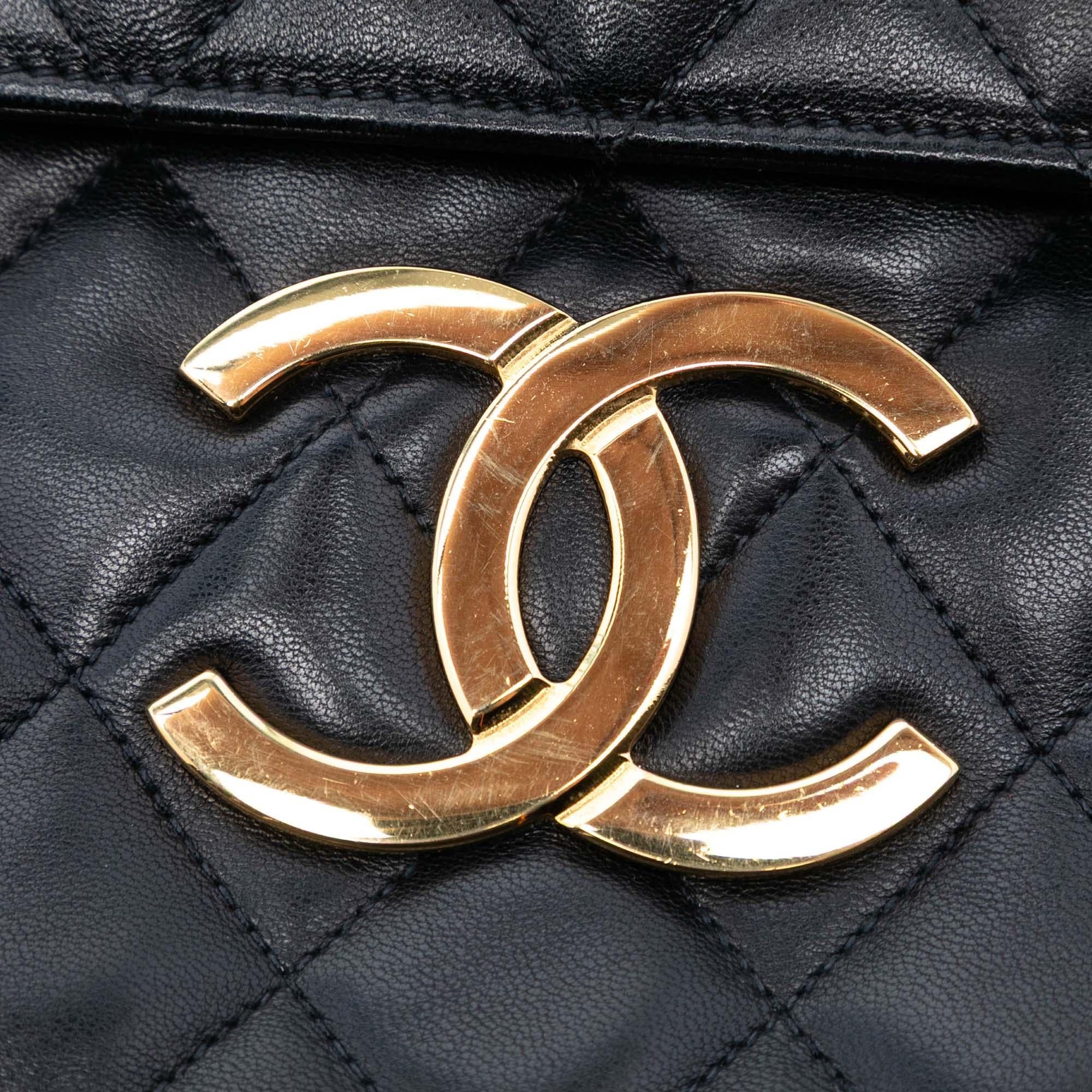 Chanel Maxi XL Quilted Lambskin Clutch with Chain