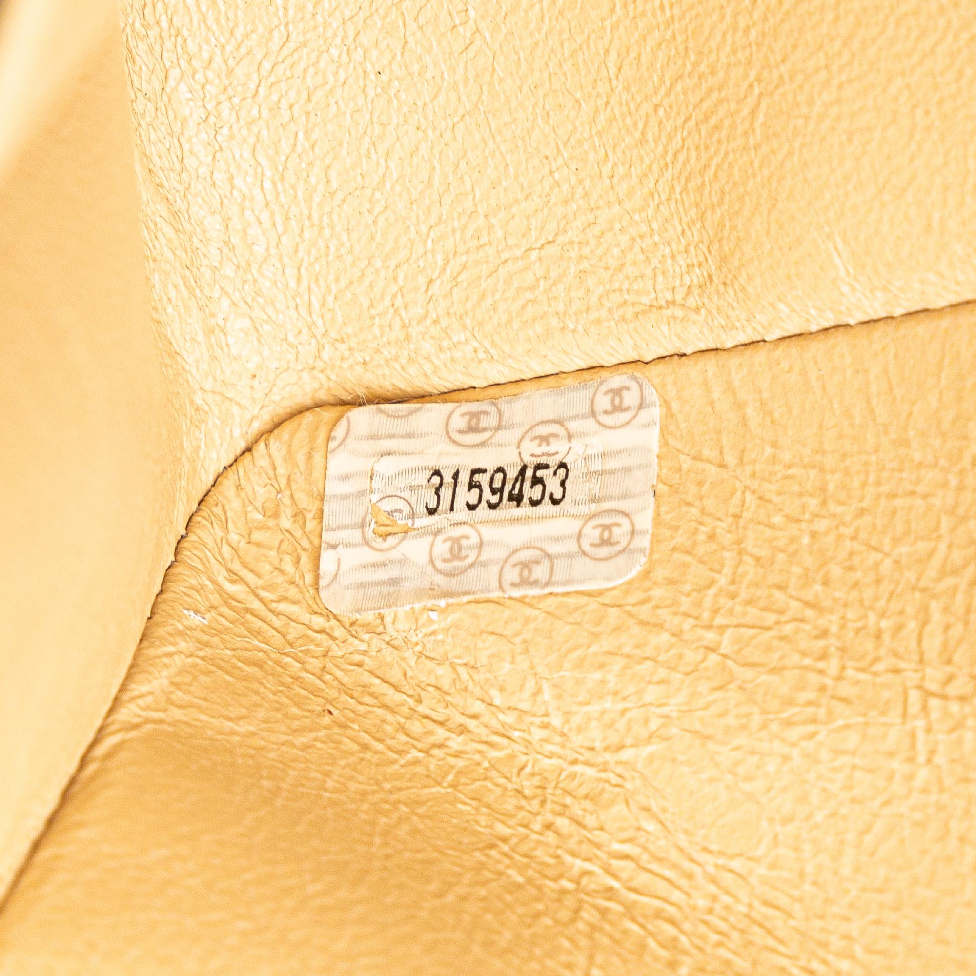Chanel Medium Classic Lambskin Double Flap (SHG-65y48i)