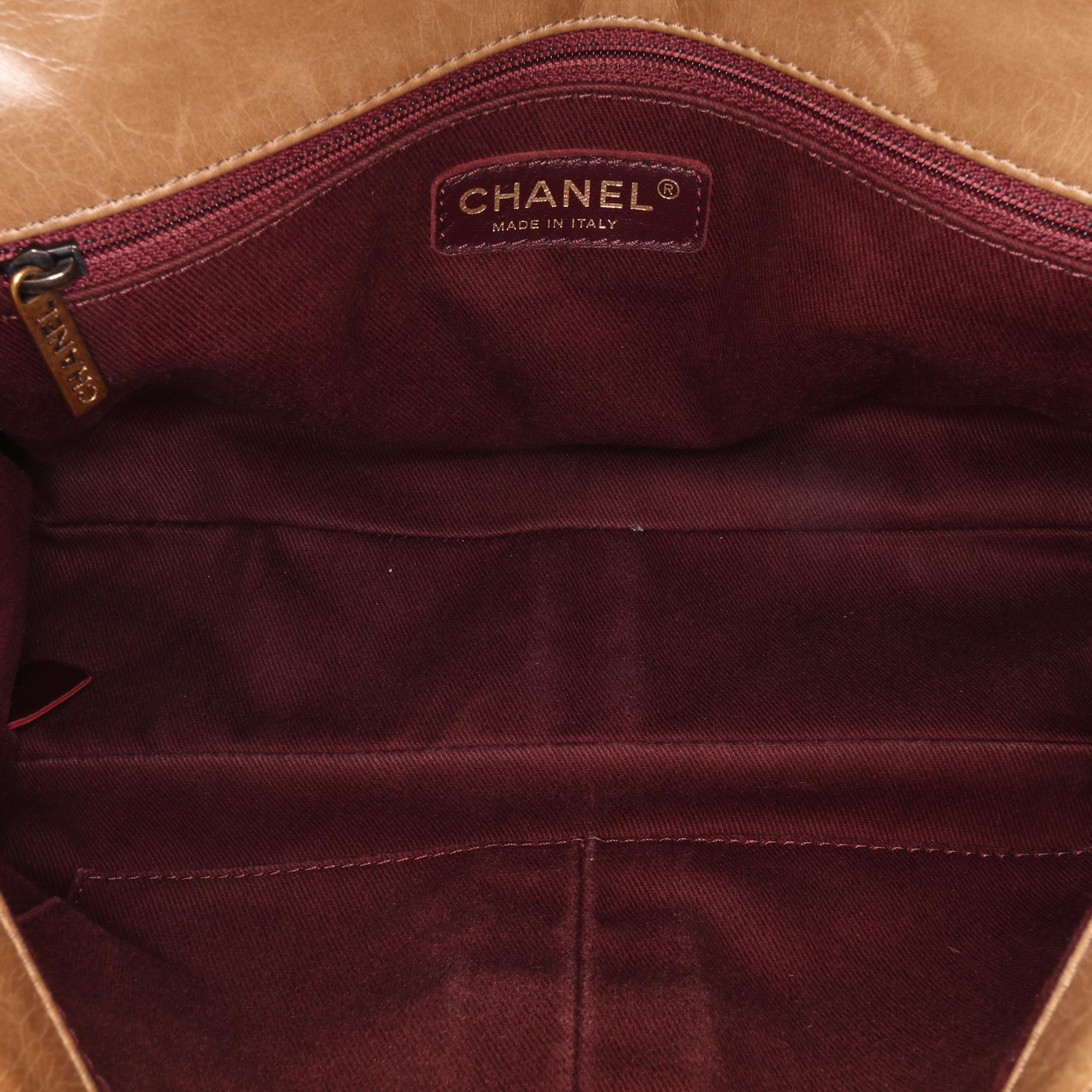 Chanel Medium Glazed Calfskin Castle Rock Top Handle Flap