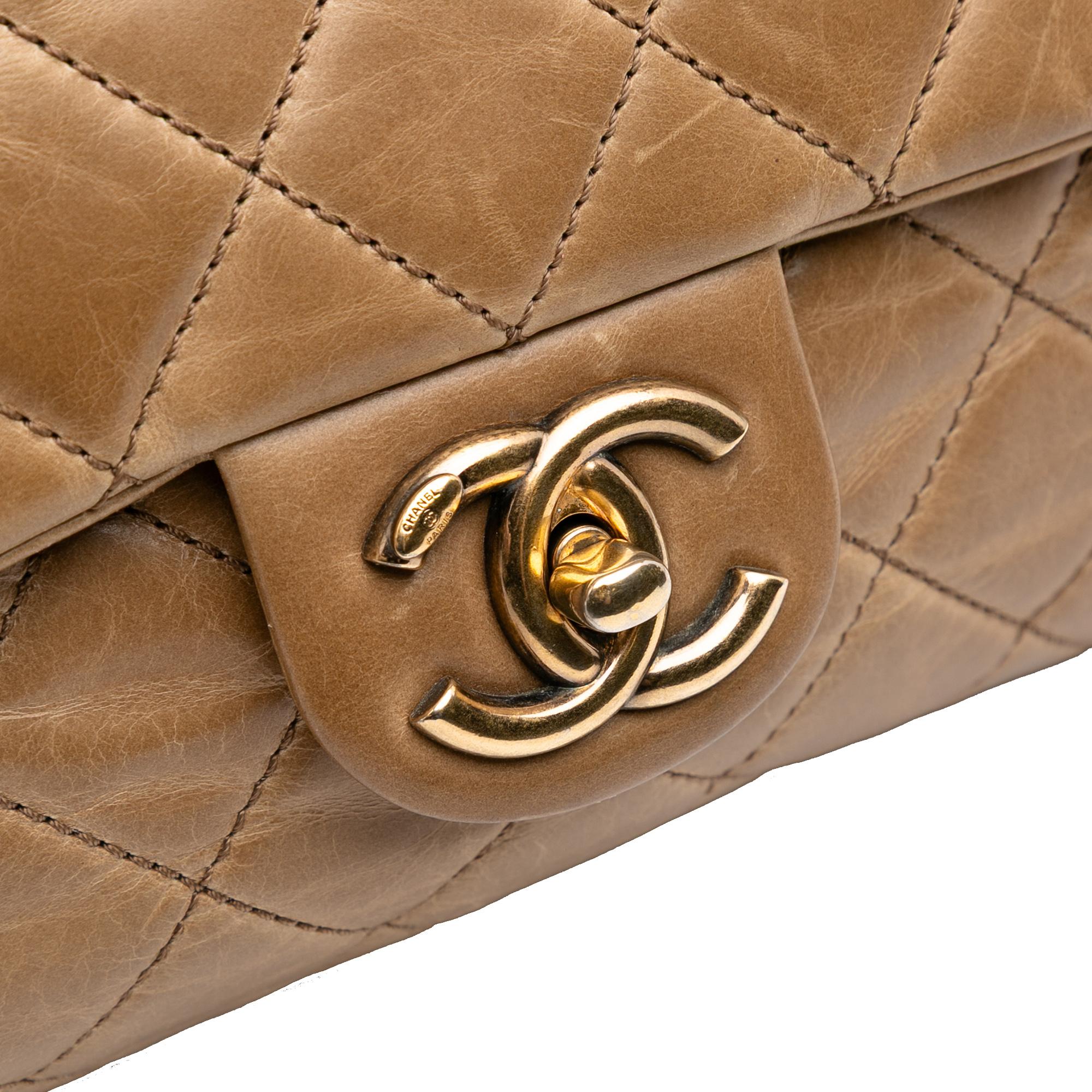 Chanel Medium Glazed Calfskin Castle Rock Top Handle Flap