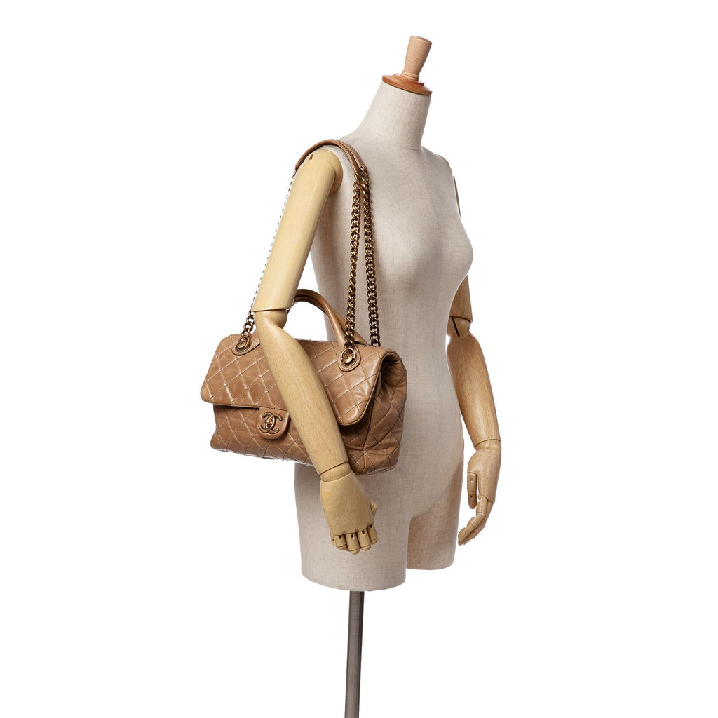 Chanel Medium Glazed Calfskin Castle Rock Top Handle Flap
