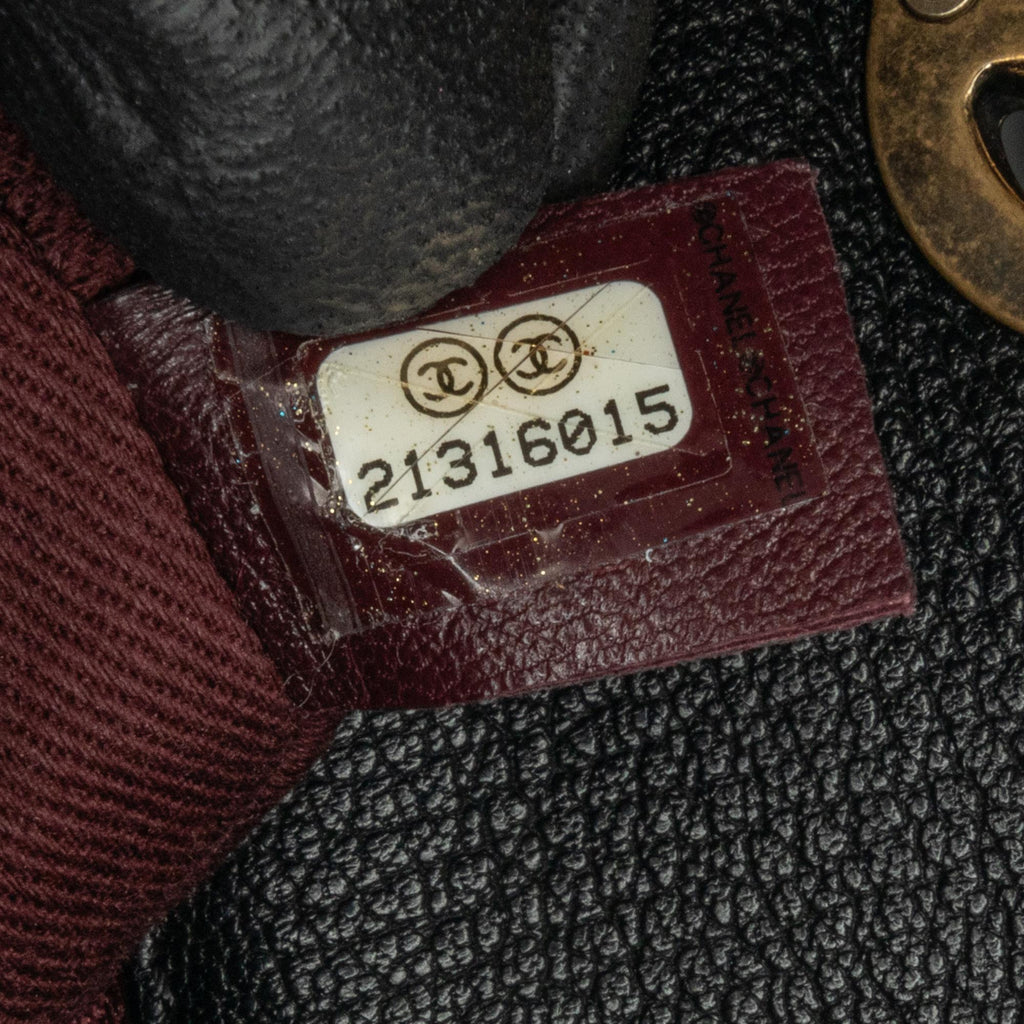 Chanel Medium Patent Goatskin CC Eyelet Flap (SHG-Xldzli)