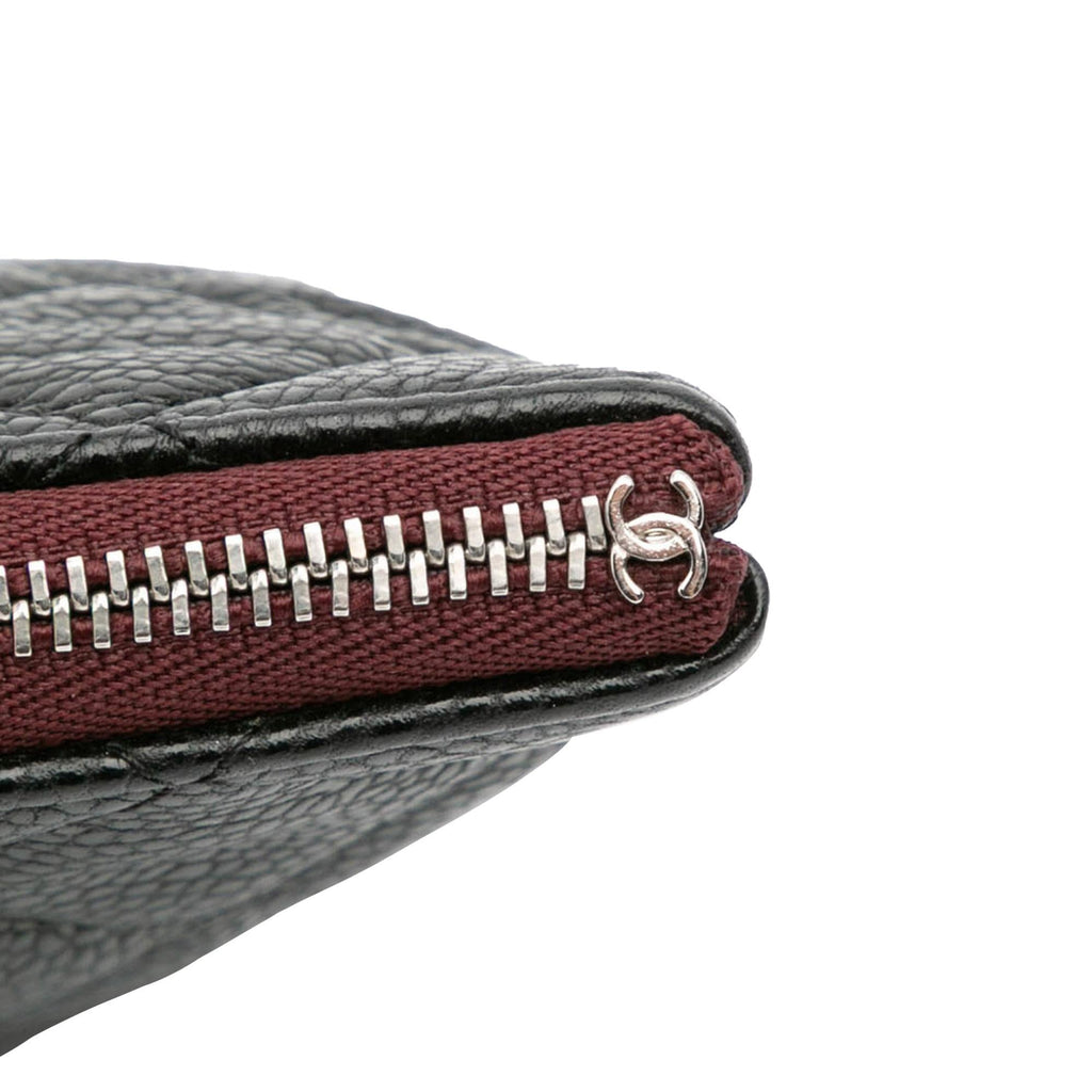 Chanel Medium Quilted Caviar O Case Clutch