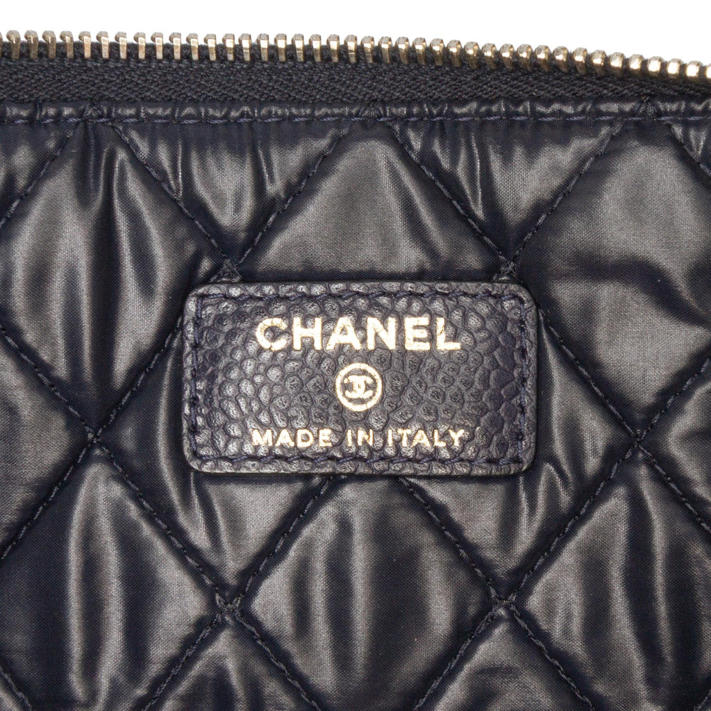 Chanel Medium Quilted Caviar O Case Clutch