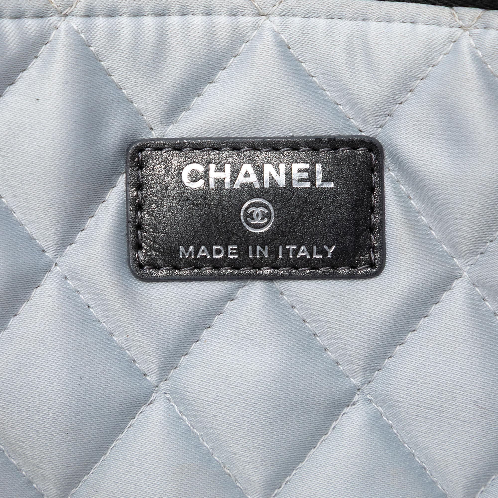 Chanel Medium Quilted Iridescent Calfskin Flower CC O Case Clutch