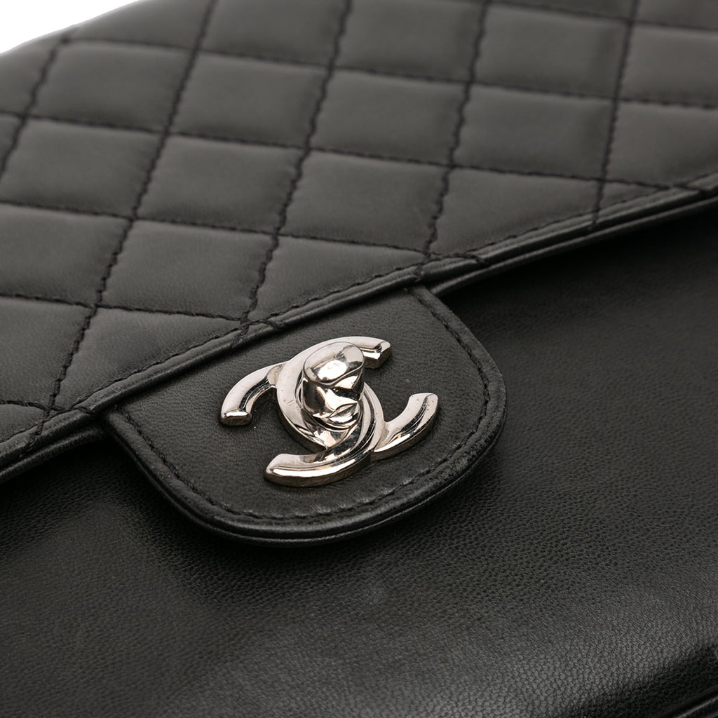 Chanel Medium Quilted Lambskin Clams Pocket Flap