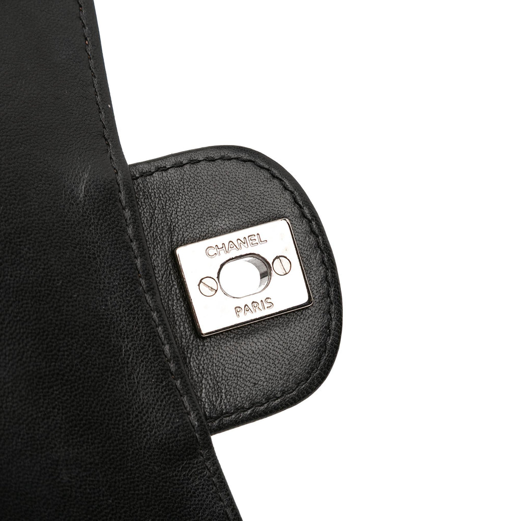 Chanel Medium Quilted Lambskin Clams Pocket Flap
