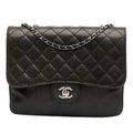 Chanel Medium Quilted Lambskin Clams Pocket Flap
